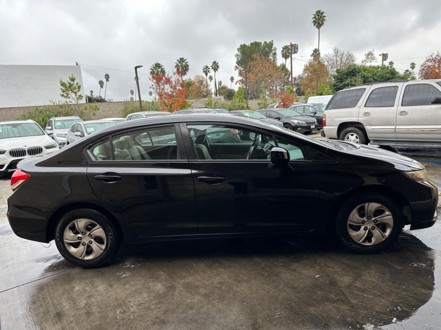 2013 Black /Grey Honda Civic LX Sedan 5-Speed AT (19XFB2F53DE) with an 1.8L L4 SOHC 16V engine, 5-Speed Automatic transmission, located at 30 S. Berkeley Avenue, Pasadena, CA, 91107, (626) 248-7567, 34.145447, -118.109398 - New Paint! Gas Saver! Discover Reliable and Efficient Driving: 2013 Honda Civic LX Now at Our Pasadena, CA Dealership Step into the world of efficiency and reliability with the 2013 Honda Civic LX, a standout choice now featured at our BHPH dealership in Pasadena, CA. Known for its dependable per - Photo#3